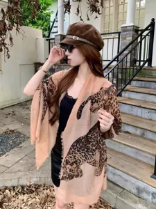 Leopard print cotton linen scarf shawl, soft texture, autumn winter fashion outdoor accessory.