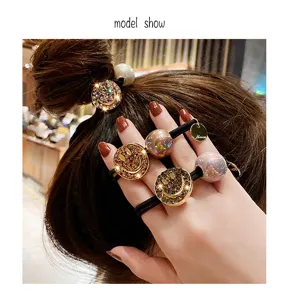Korean chic pearl rhinestone metal smiley face hair rope fashion ponytail hair band for women