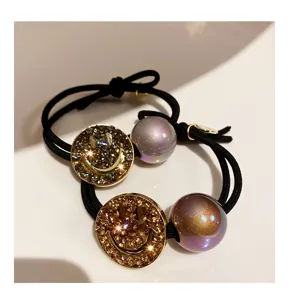 Korean style fashion hair tie with sparkling rhinestone smiley face and colorful pearl bead.