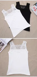 Detailed top view of the women's white and black lace trim camisole flat lay setup.