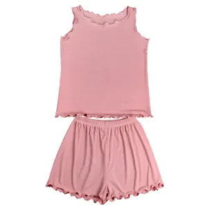 Pink ribbed lettuce edge tank top and shorts lounge set for women casual summer wear.