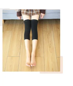Black fleece lined over the knee leg warmers for women, thick thermal knee high socks.