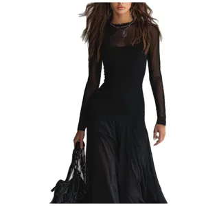 Detailed view of the black mesh splicing long dress, elegant design and fine fabric.