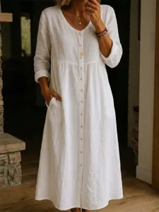 Detailed view of casual white long sleeve cotton linen button maxi dress with pockets.