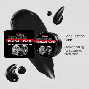 Detail view of black tire renovator paste jar and box with smooth texture paste background.