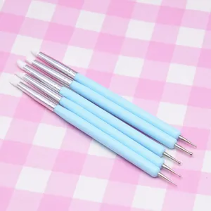 Pinceles de silicona de doble punta para uñas y herramientas de modelado de arcilla azul claro.