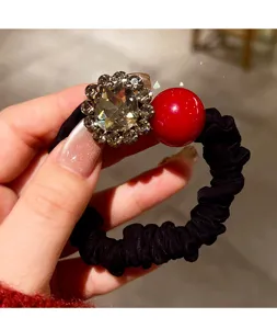 Black hair scrunchie with sparkling rhinestone flower and red pearl for women ponytails daily use