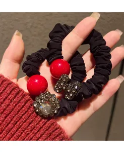 Black fabric scrunchie with red beads and rhinestone letter H hair tie for women.