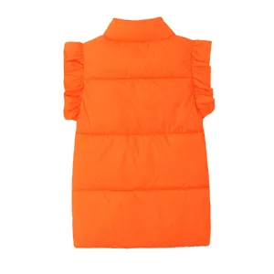 Back detail of orange puffer vest, stand collar and flutter sleeves, winter style.