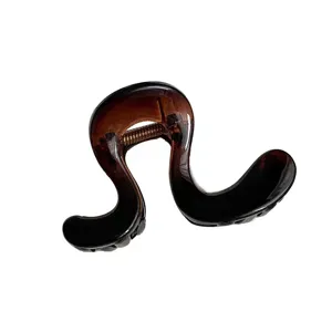 Elegante molletta per capelli marrone curva per donne, pinza per capelli alla moda e pratica.