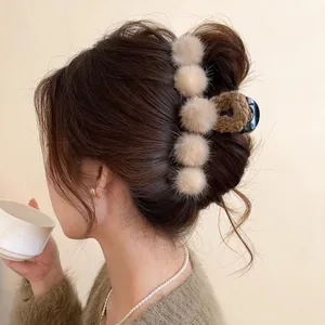 Autumn winter plush hair claw clip for women, large fuzzy hair catcher for elegant updos.
