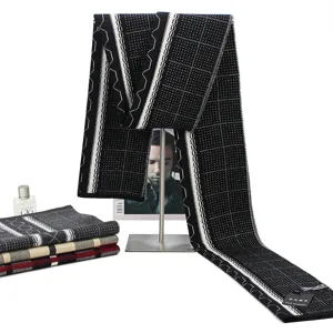 Winter warm knit wool scarf with classic black and white grid pattern for men and women.