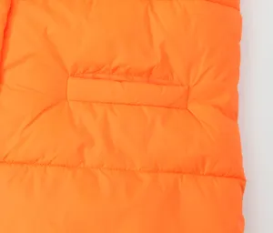 Orange puffer vest pocket detail view, casual winter warm outerwear close up display.