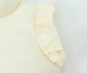 Close-up detail of women's stand collar ruffle sleeveless padded vest in beige color