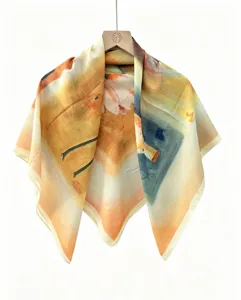 Artistic abstract print square scarf, lightweight material, elegant draping effect detail.