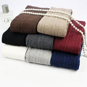 Cozy cable knit over-the-knee socks for women, warm winter long cotton thigh high stockings.