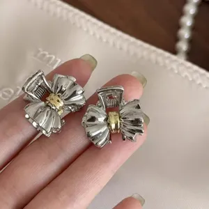Molla per capelli con fiocco in metallo argento e oro, mini pinza chic per acconciature.