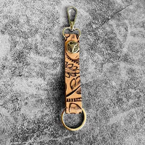 Western vintage genuine leather embossed keychain with metal bull skull charm and lobster clasp