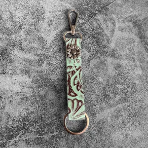 Western genuine leather embossed keychain with floral tooling design and vintage metal sunflower.