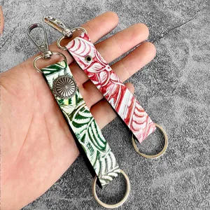 Genuine leather embossed keychain retro vintage bag pendant multi-color Western style hardware.