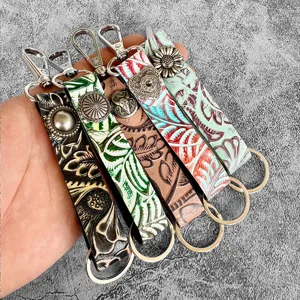Western Cowboy Genuine Leather Embossed Keychain American Vintage Alloy Flower Bull Head Key Ring Car Bag Charm Pendant For Men Women