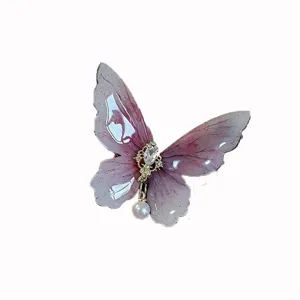 Fairy purple butterfly hair clip with pearls and rhinestones, elegant side clip for summer style.