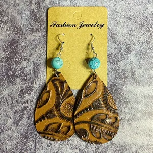 Boucles d'oreilles pendantes longues en cuir turquoise vintage style bohème western bijoux