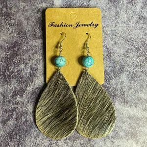 Boucles d'oreilles pendantes en cuir de vache style bohème vintage avec perles turquoise femmes