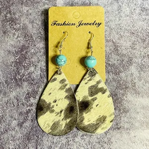 Boucles d'oreilles pendantes en cuir de vachette goutte d'eau perles turquoise style rétro.