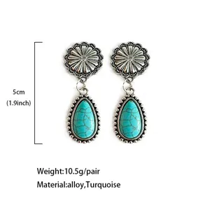 Vintage turquoise drop earrings detail, western alloy sunflower jewelry with stone pendant.