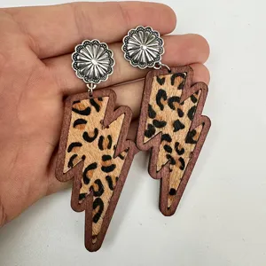 Western leopard print wooden lightning drop earrings with silver flower studs for women fashion.
