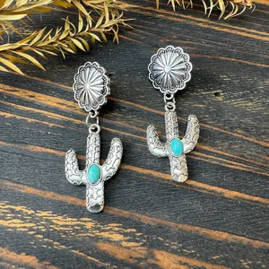 Western vintage silver metal earrings featuring sunflower studs and turquoise cactus pendants.