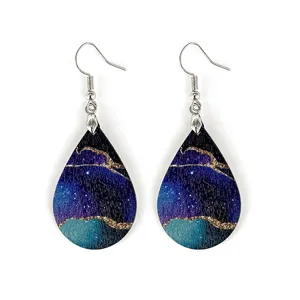 Summer wave wood earrings bohemian marble print lightweight drop earrings close up detail.