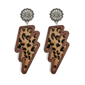 Western leopard print wooden lightning bolt earrings with silver concho studs for women fashion.
