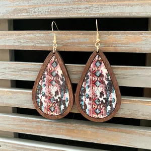 Boho rustic wooden teardrop earrings with vintage Aztec geometric print and gold hooks.