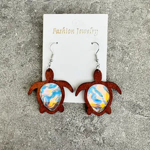 Chic wooden turtle drop earrings with ocean wave acrylic inlay, perfect summer beach jewelry.