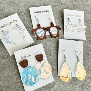 Detailed view of summer ocean ripple acrylic earrings set, featuring cute animal shapes.