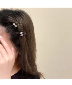 Elegant mini hair claw clips with sparkling rhinestones, perfect for cute styling and daily wear.