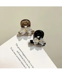 Small rhinestone bow hair claw clips set, cute crystal shark clips for women and girls daily hair styling.