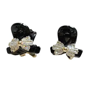 Korean small hair claw clip with crystal rhinestone bow design, perfect for daily styling and bangs.