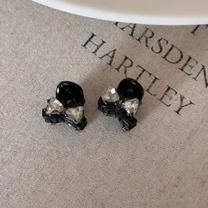 Kleine schwarze Schleifen-Haarklammer mit Strass, elegante Mini-Haarklammer für Frisuren.