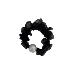 Zwarte chiffon haarring met iriserende parel elegante elastische haarband voor dames