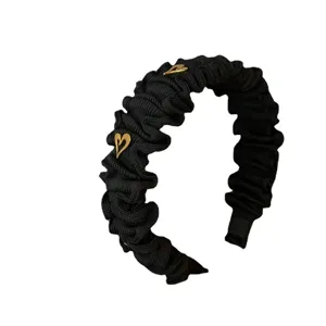 Schwarzer geraffter Haarreif mit goldenen Herzanhängern stylischer Haarschmuck Damen Mode