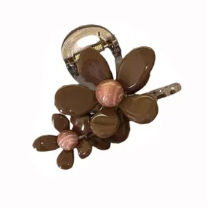 Korean style brown flower hair claw clip for women, elegant summer shark clip accessory.