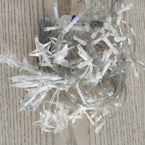 Detailed view of USB powered LED star string lights with transparent wires for decor.