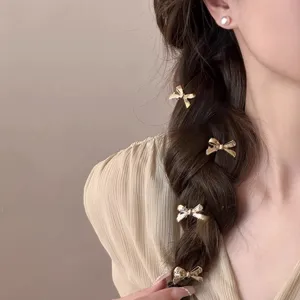Petites pinces à cheveux nœud papillon en métal pour femmes, accessoires de mode élégants.