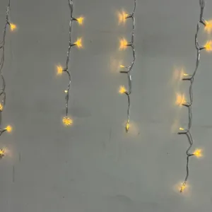 LED star curtain lights warm yellow hanging string lights for holiday party decoration.
