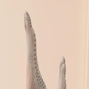 Detail of five toe yoga socks grip anti slip bottom for pilates workout and fitness.