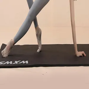 Non-slip five-toe yoga socks for women, professional pilates grip socks detail view.