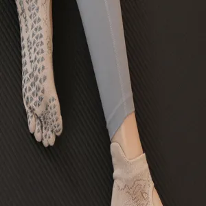 Detail view of non-slip five toe yoga socks with grip dots for pilates fitness sports.